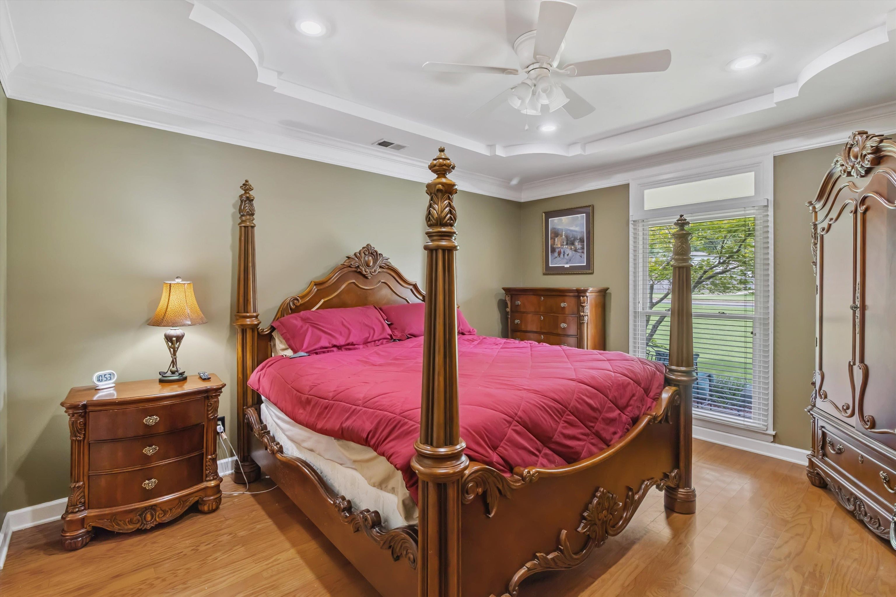 683 Fletcher Road Collierville, TN 38017 - Photo 16 of 30 a bed room with a bed and a dresser