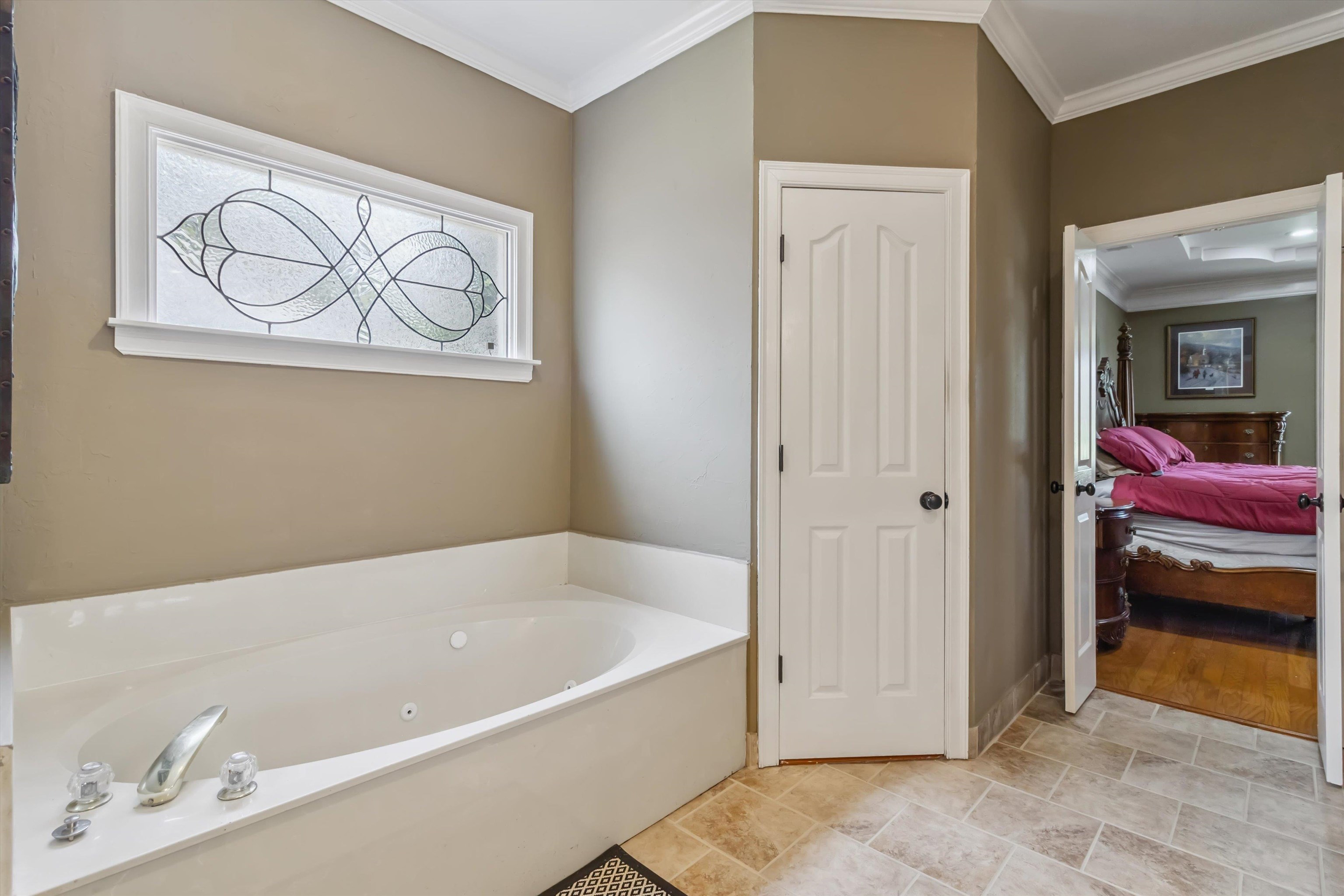683 Fletcher Road Collierville, TN 38017 - Photo 19 of 30 a bathroom with a tub and a shower