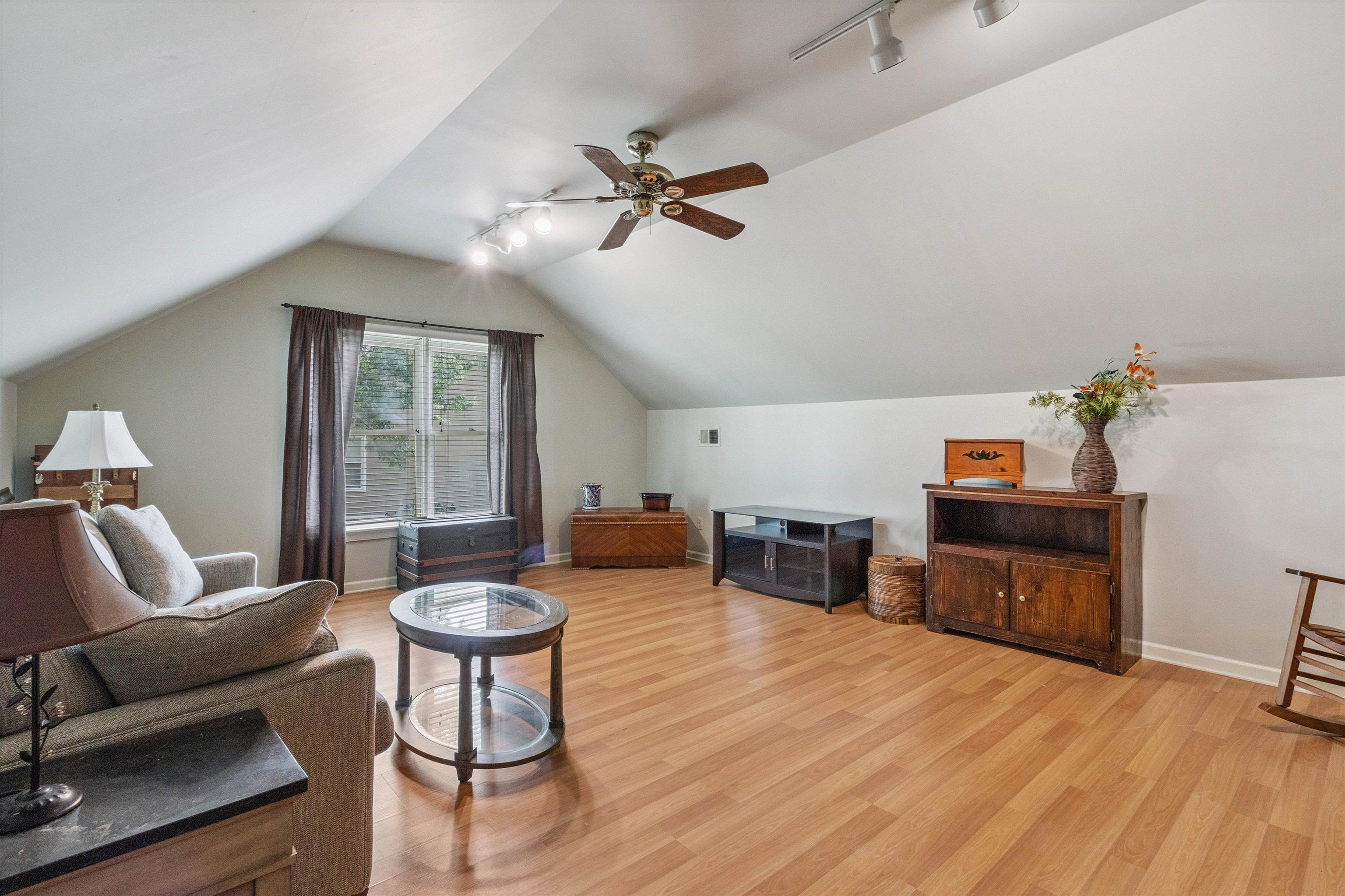 683 Fletcher Road Collierville, TN 38017 - Photo 25 of 30 a living room with furniture and a wooden floor