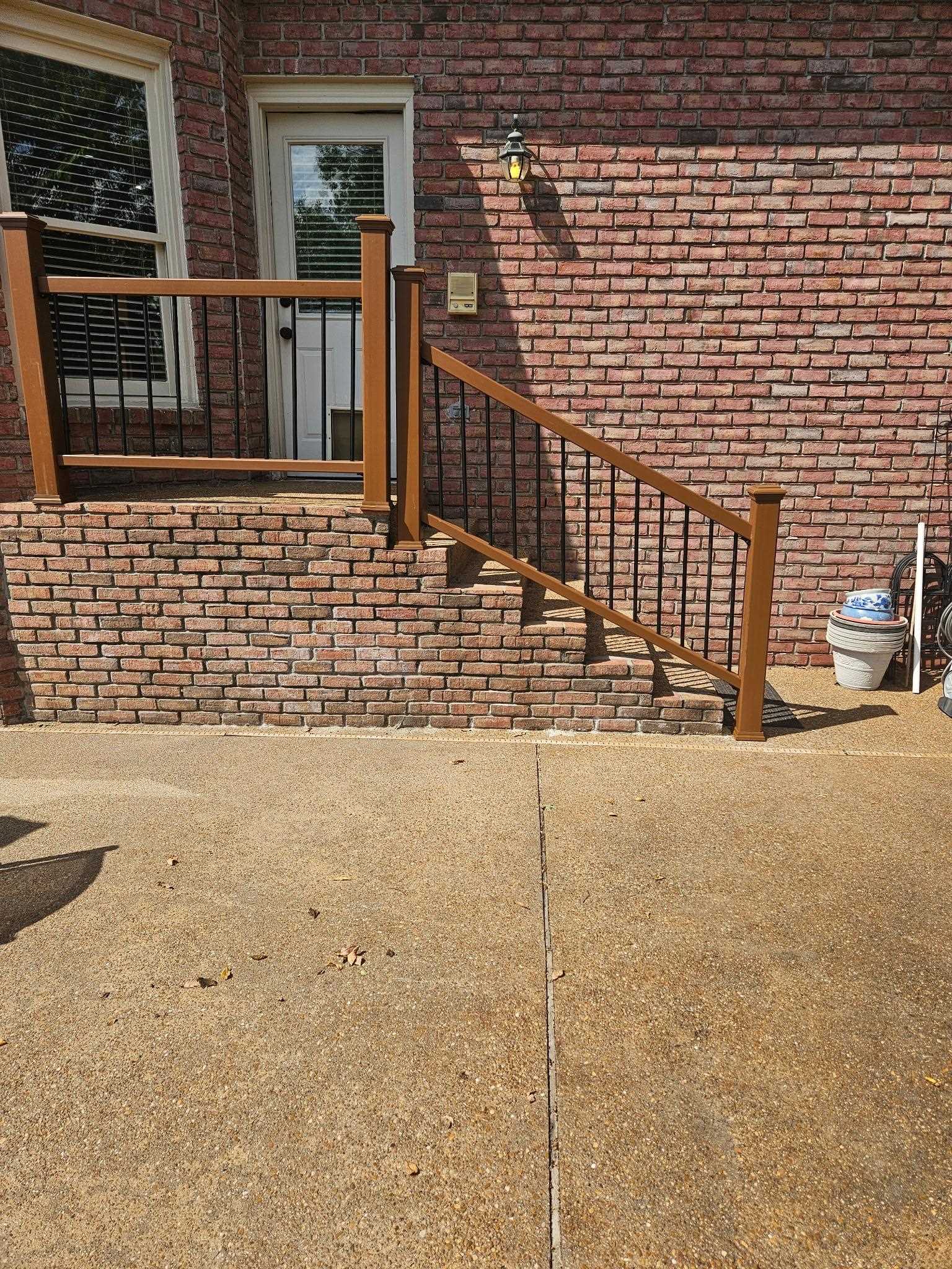 683 Fletcher Road Collierville, TN 38017 - Photo 29 of 30 a view of a brick house with a street