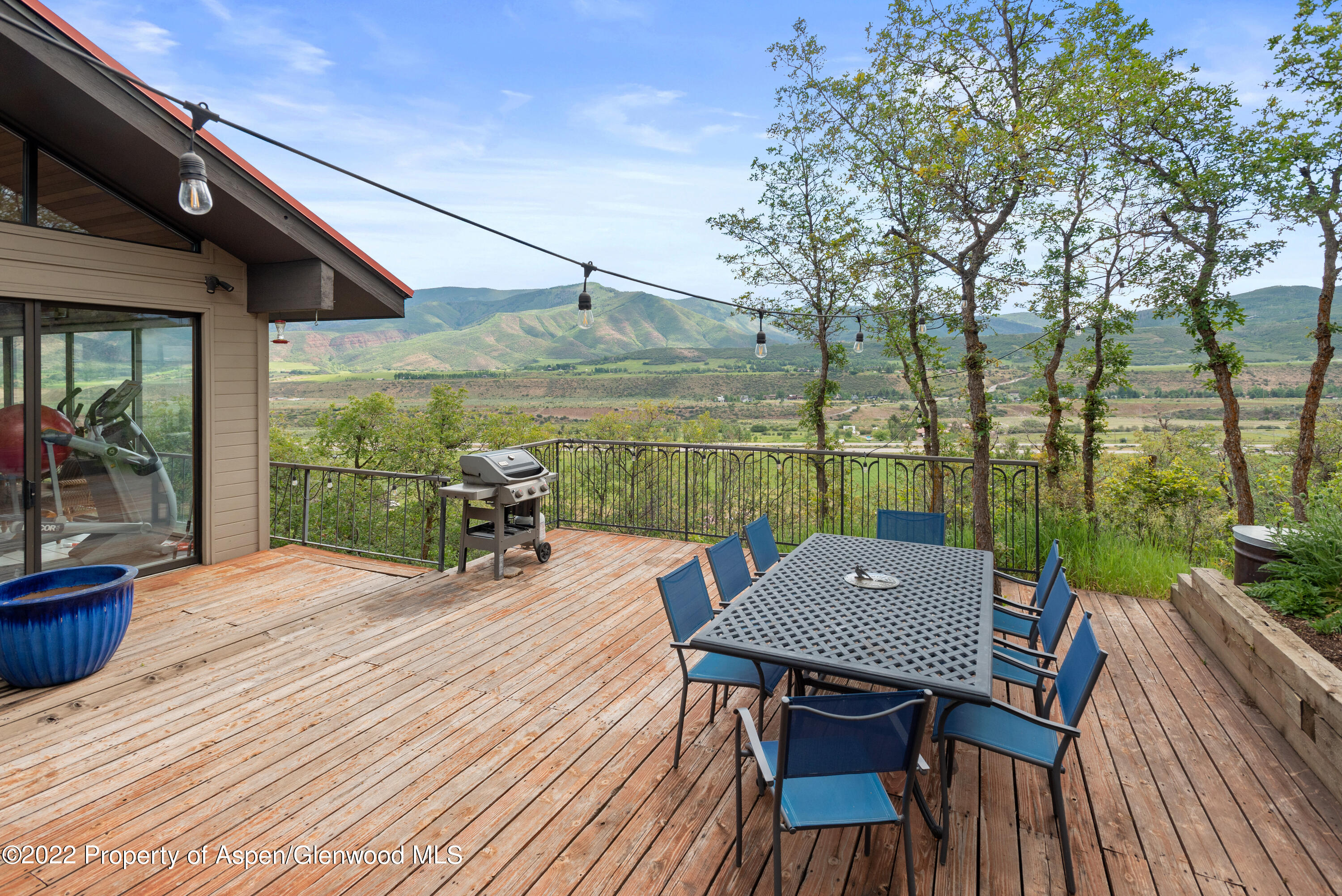 540 Upper Ranch Road Aspen, CO 81611 - Photo 14 of 24 a outdoor view with a sitting space and large trees