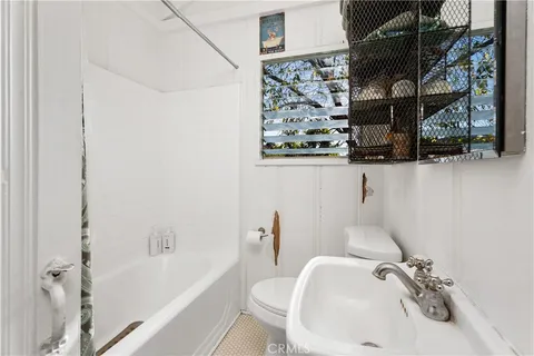 a bathroom with a sink and a tub