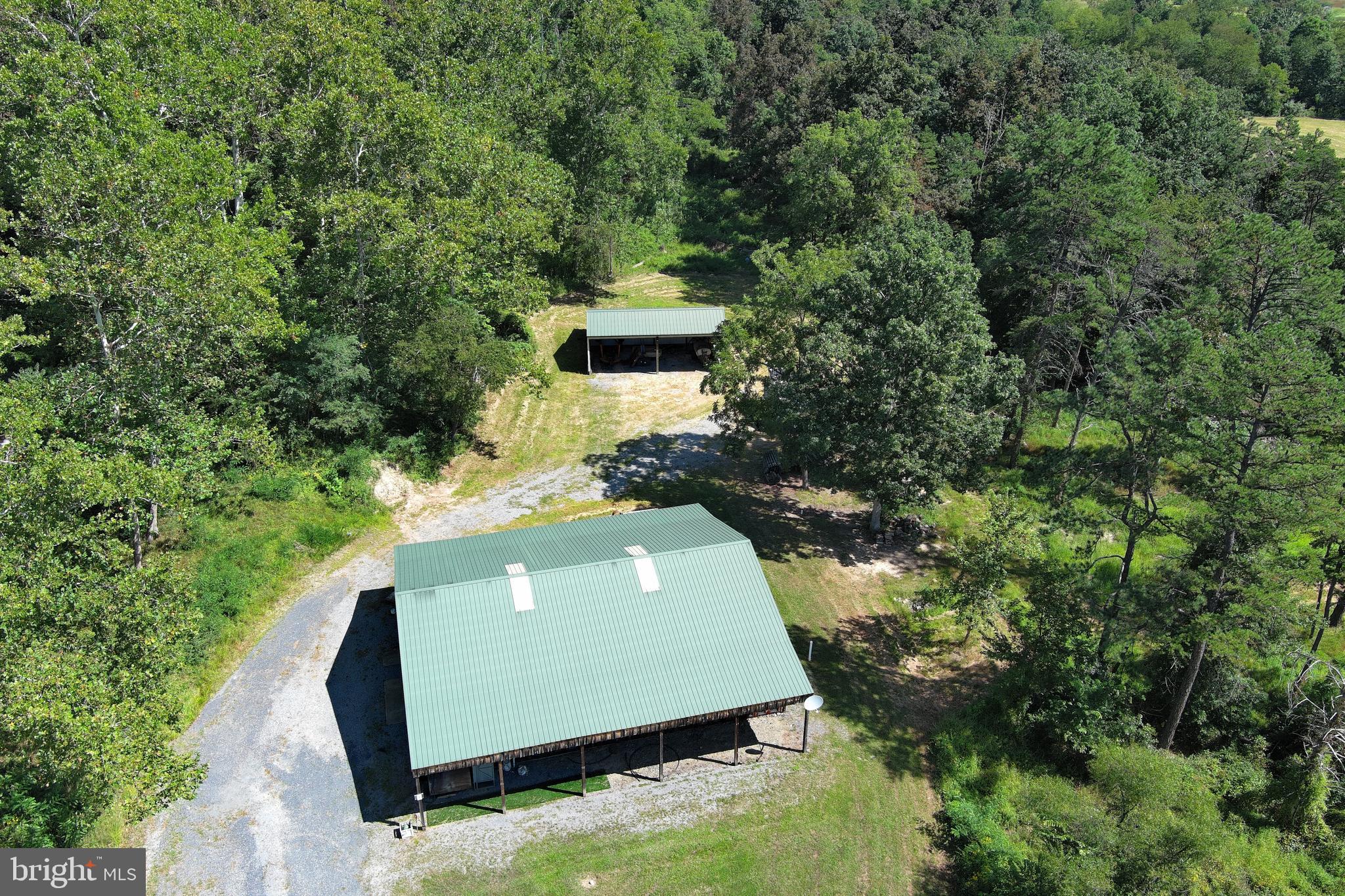 40.955 Ac Intersection Rt 50 & Smokey Hollow Road Bloomery, WV 26817 - Photo 58 of 83 a view of house with a yard