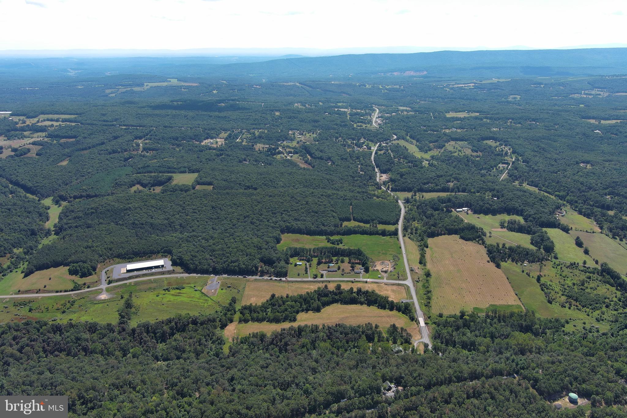 40.955 Ac Intersection Rt 50 & Smokey Hollow Road Bloomery, WV 26817 - Photo 73 of 83 an aerial view of residential house with outdoor space