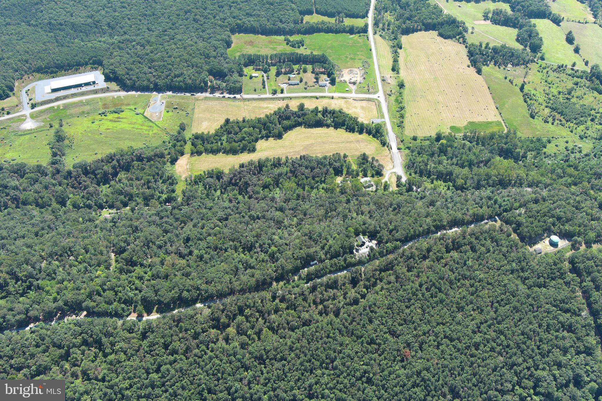 40.955 Ac Intersection Rt 50 & Smokey Hollow Road Bloomery, WV 26817 - Photo 74 of 83 an aerial view of a residential houses with outdoor space and street view
