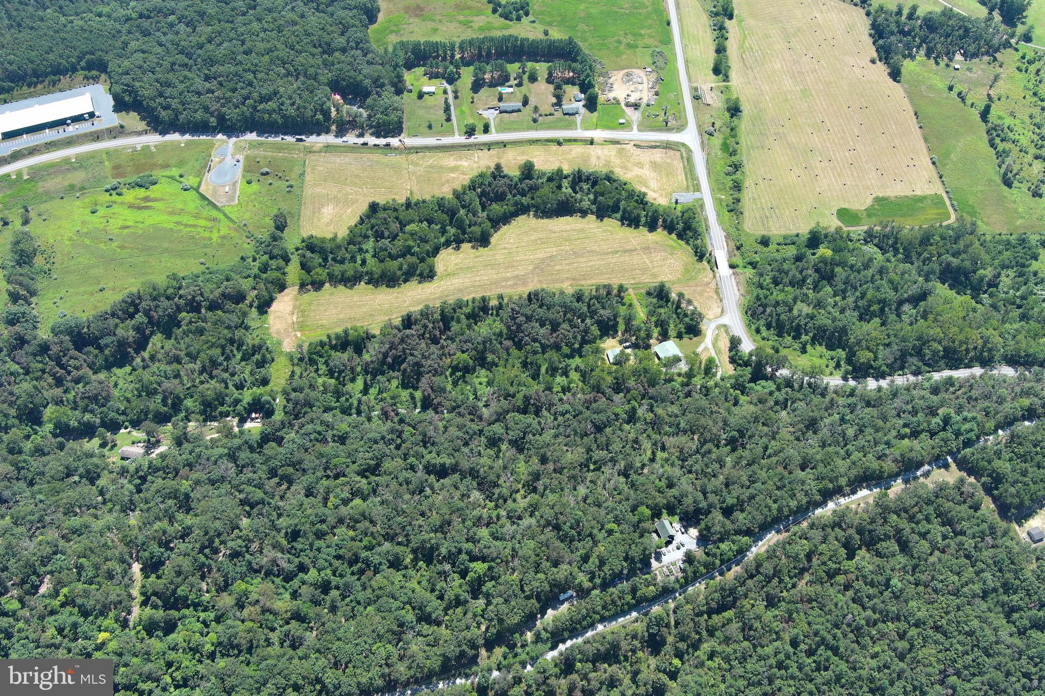 40.955 Ac Intersection Rt 50 & Smokey Hollow Road Bloomery, WV 26817 - Photo 75 of 83 an aerial view of a house with a yard