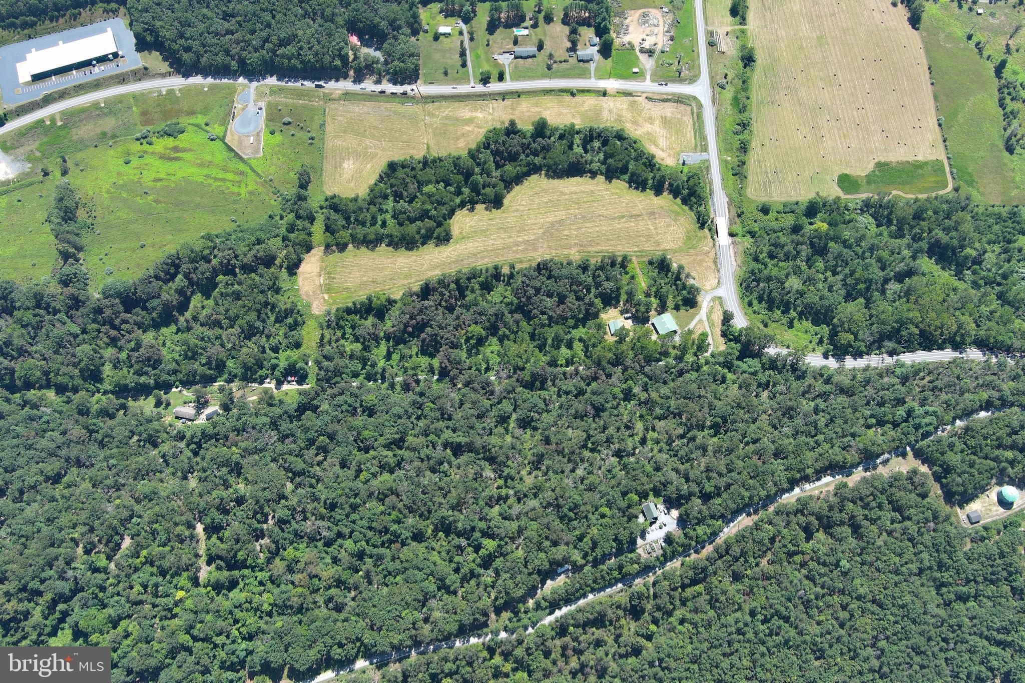 40.955 Ac Intersection Rt 50 & Smokey Hollow Road Bloomery, WV 26817 - Photo 77 of 83 an aerial view of a house having yard