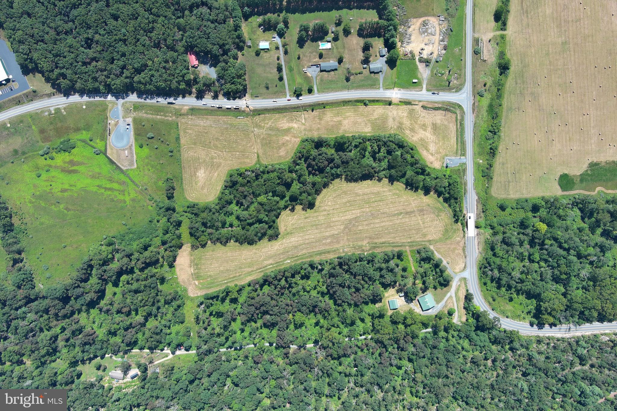 40.955 Ac Intersection Rt 50 & Smokey Hollow Road Bloomery, WV 26817 - Photo 78 of 83 an aerial view of a residential houses with outdoor space