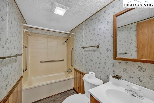 a bathroom with a sink and a bathtub