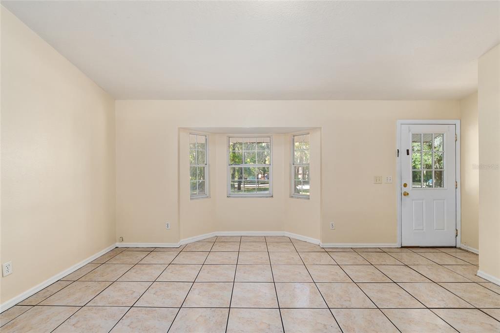 4329 Northwest 155th Street Reddick, FL 32686 - Photo 15 of 52 an empty room with windows