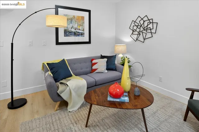 a living room with furniture and rug