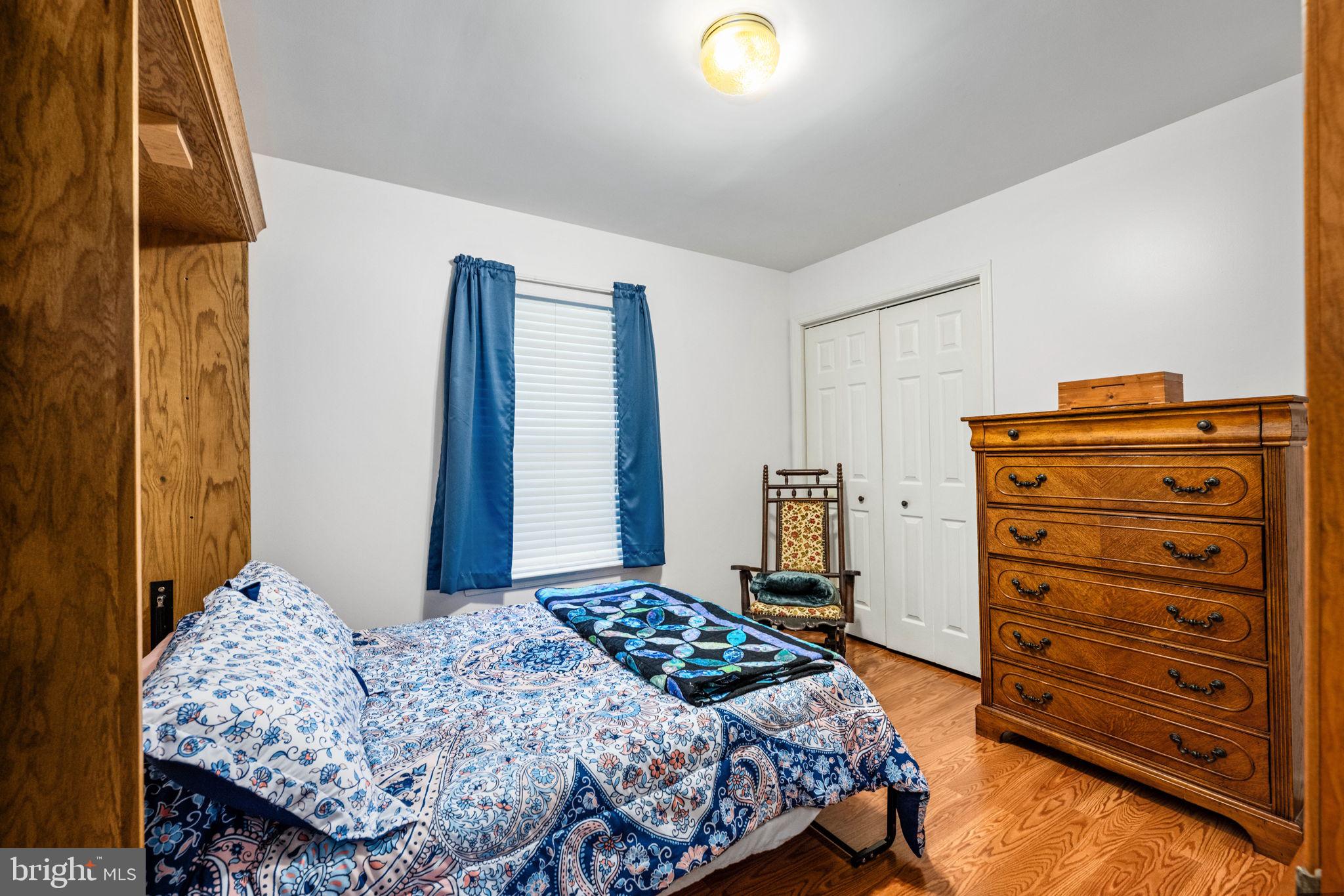 203 Fairfax Lane Locust Grove, VA 22508 - Photo 15 of 54 a bedroom with a bed and a dresser