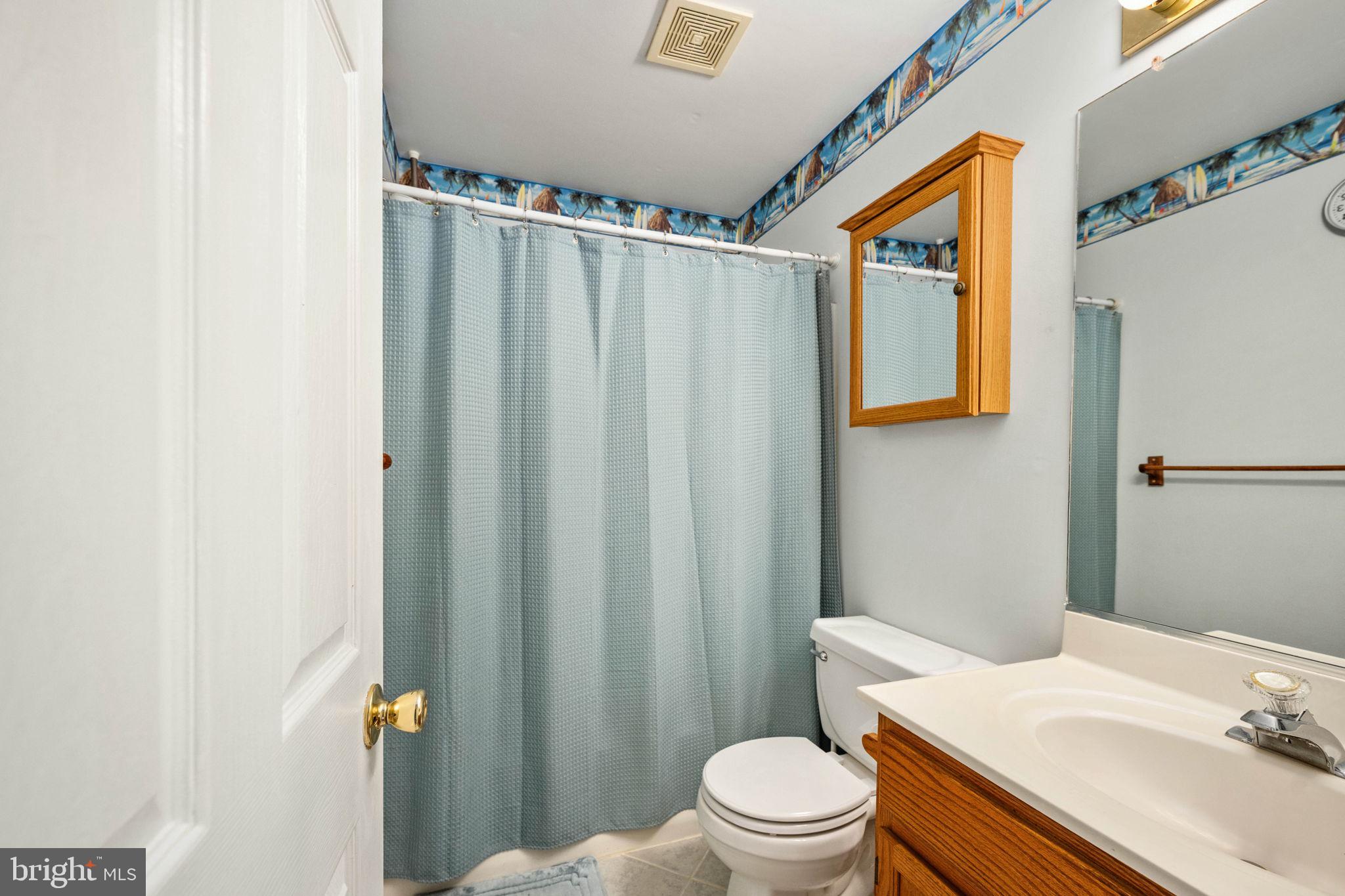 203 Fairfax Lane Locust Grove, VA 22508 - Photo 21 of 54 a bathroom with a sink toilet and shower