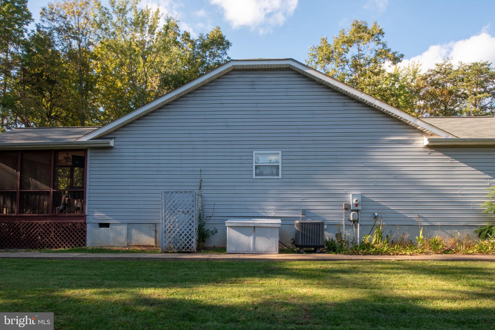 203 Fairfax Lane Locust Grove, VA 22508 - Photo 33 of 54 a front view of house with yard