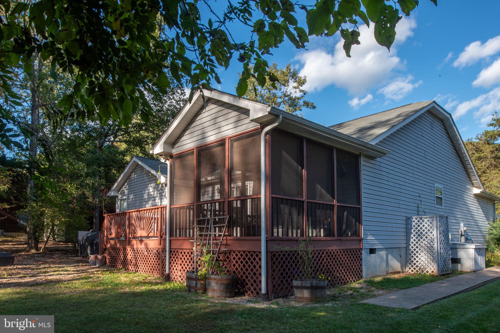 203 Fairfax Lane Locust Grove, VA 22508 - Photo 35 of 54 a view of house with a yard