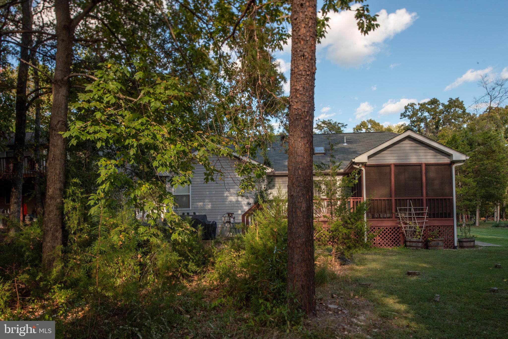 203 Fairfax Lane Locust Grove, VA 22508 - Photo 37 of 54 a front view of a house with yard