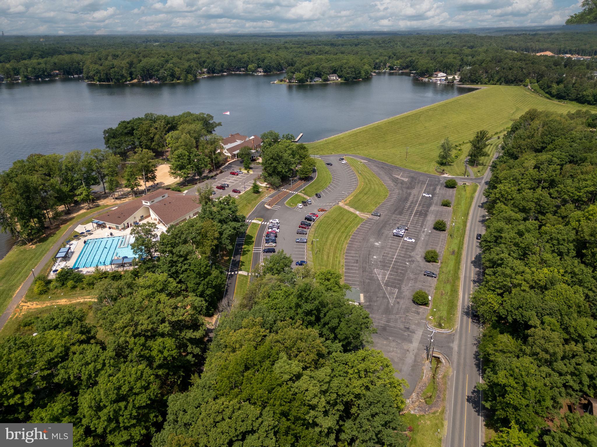 203 Fairfax Lane Locust Grove, VA 22508 - Photo 45 of 54 an aerial view of lake residential house with swimming pool and outdoor space