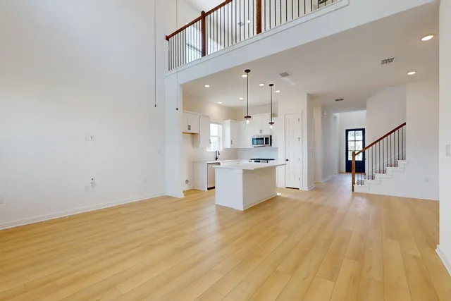 a view of kitchen with wooden floor