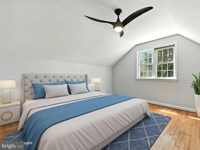 a kitchen with stainless steel appliances granite countertop a stove a sink dishwasher and cabinets with wooden floor