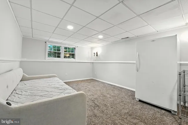 a view of a lake with sitting area