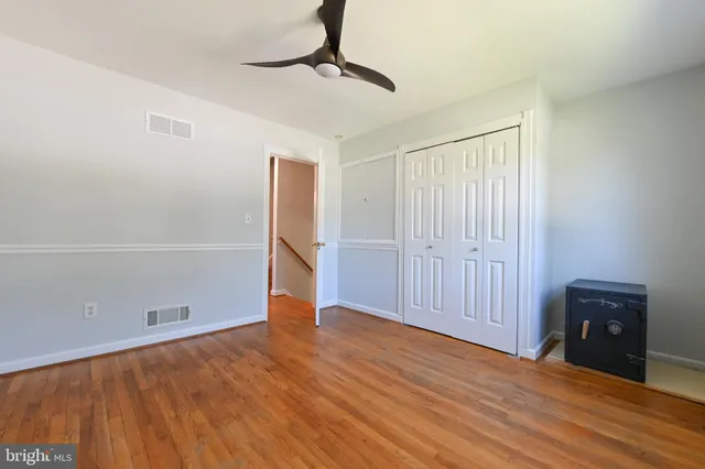 a view of a lake with a wooden deck