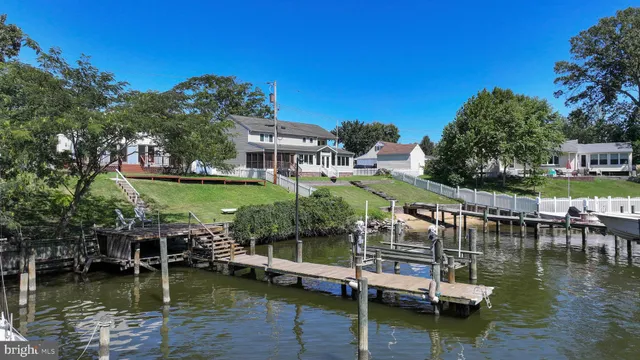 a picture of a bench in front of a wall