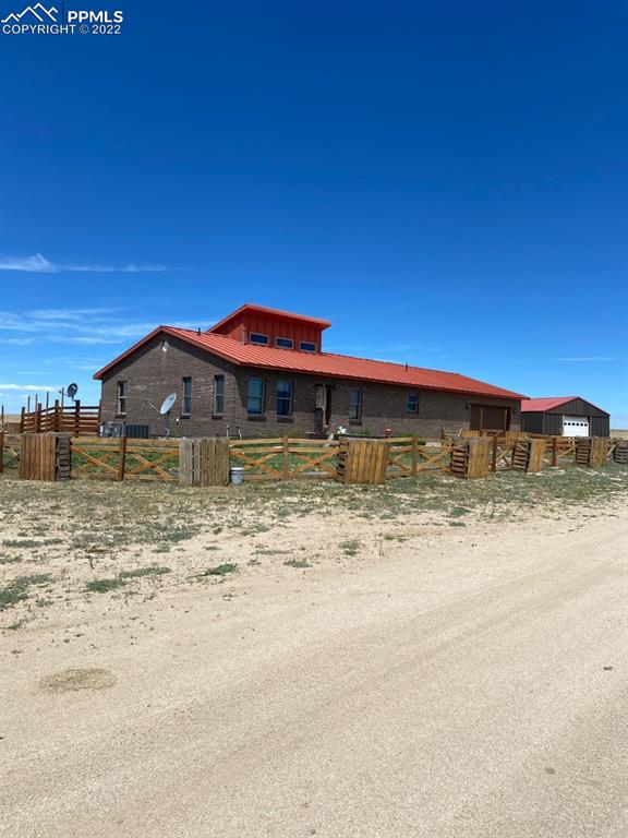 41470 Hoot Owl Road Ramah, CO 80832 - Photo 1 of 20 a view of a house with a yard