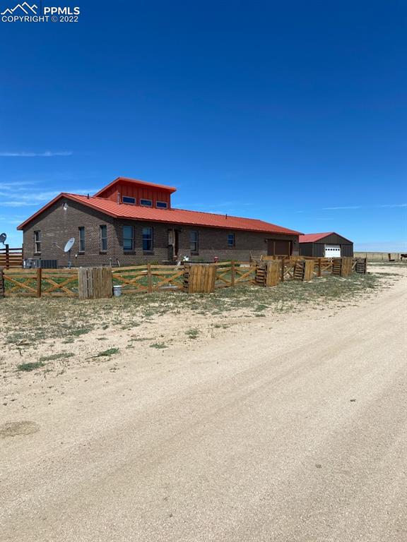 41470 Hoot Owl Road Ramah, CO 80832 - Photo 15 of 20 a view of a house with a yard