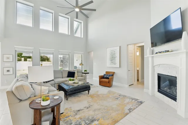 a living room with furniture or couch and a potted plant