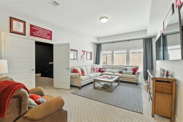 a living room with furniture and a couch