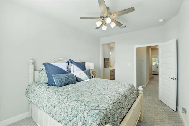 a bathroom with a double vanity sink mirror and shower