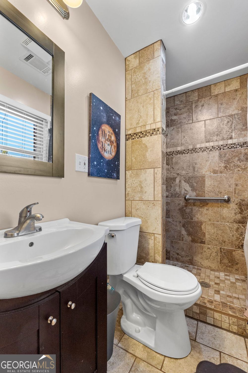 1793 Trice Cemetery Road Thomaston, GA 30286 - Photo 28 of 59 a bathroom with a sink toilet and shower