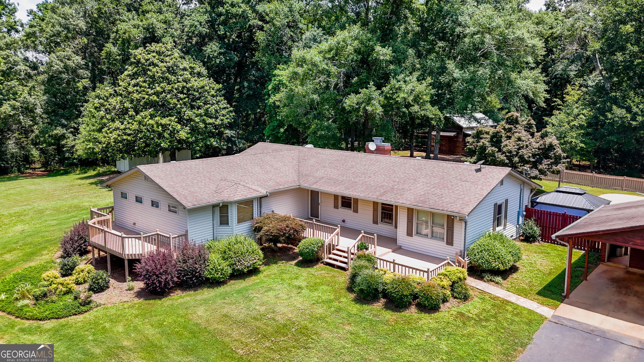 1793 Trice Cemetery Road Thomaston, GA 30286 - Photo 34 of 59 a aerial view of a house with yard and green space