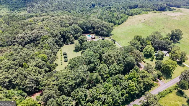 a view of a back yard of the house