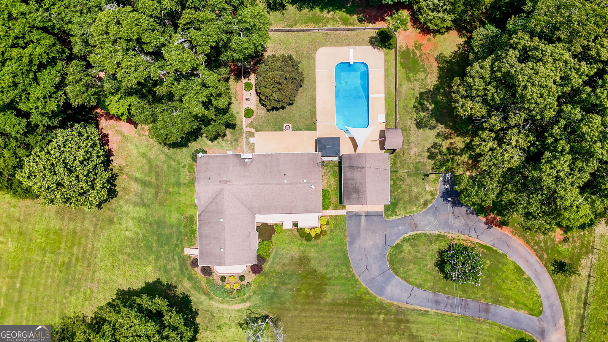 1793 Trice Cemetery Road Thomaston, GA 30286 - Photo 43 of 59 an aerial view of a house with a yard and large trees