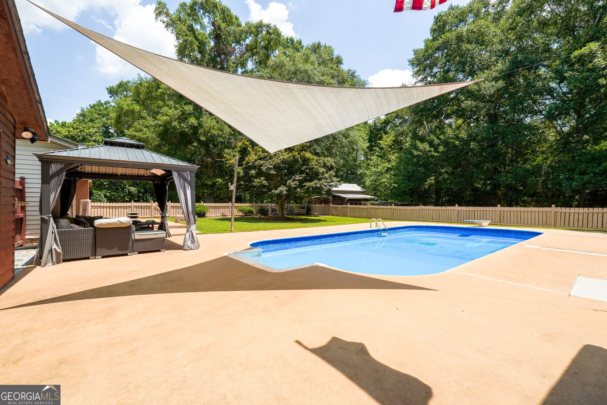 1793 Trice Cemetery Road Thomaston, GA 30286 - Photo 53 of 59 a view of a swimming pool with an outdoor space