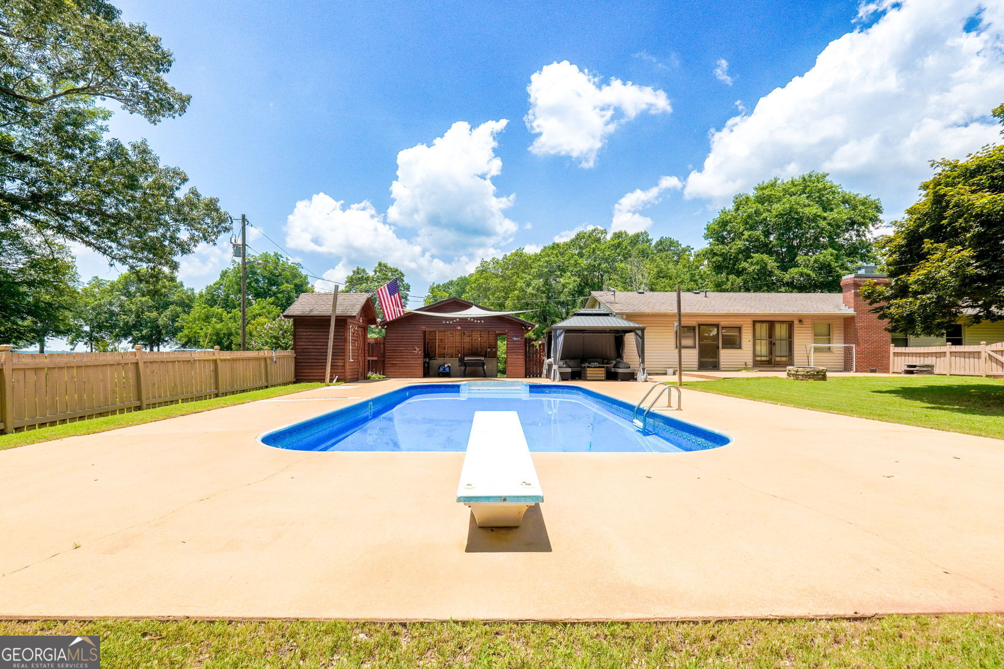 1793 Trice Cemetery Road Thomaston, GA 30286 - Photo 55 of 59 a view of a swimming pool with a patio