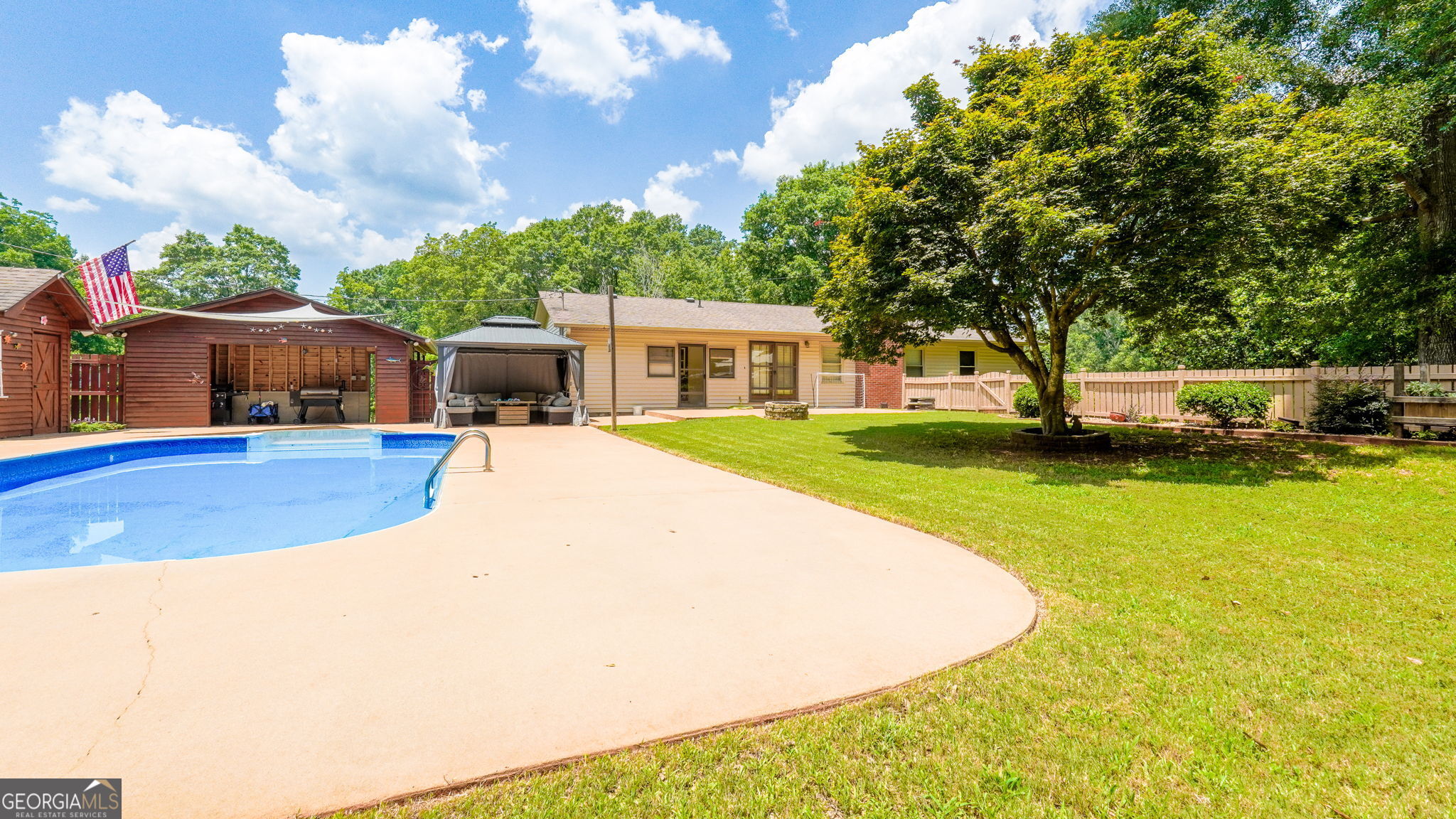1793 Trice Cemetery Road Thomaston, GA 30286 - Photo 56 of 59 a view of a house with swimming pool