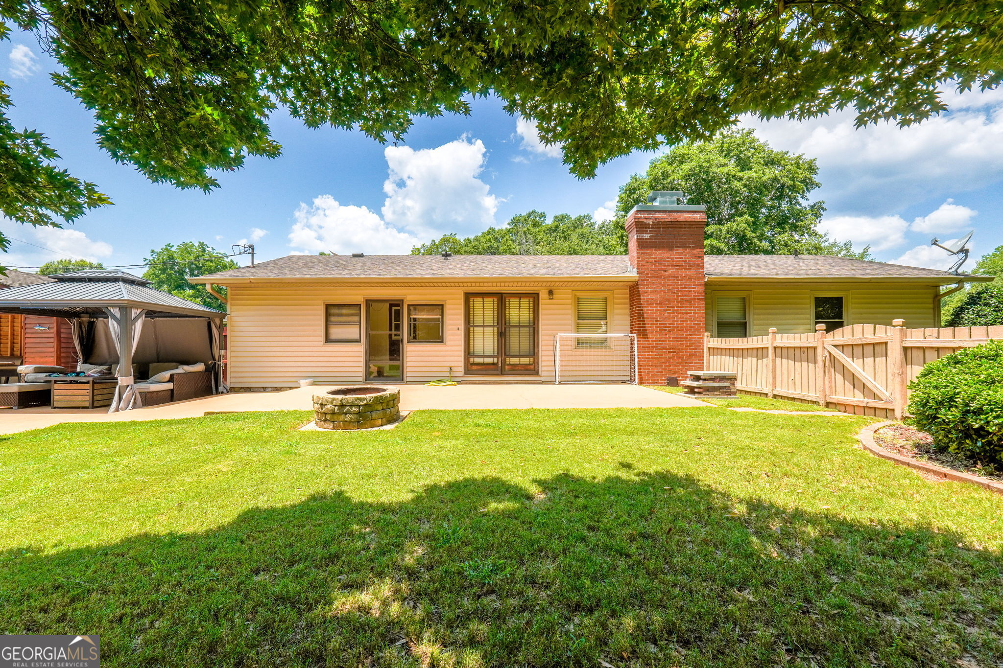 1793 Trice Cemetery Road Thomaston, GA 30286 - Photo 58 of 59 a view of a house with swimming pool and a yard