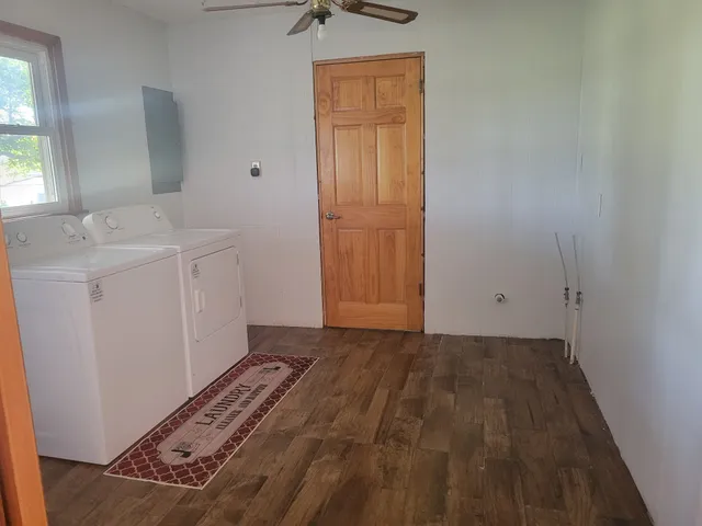 a bathroom with a bathtub and a toilet
