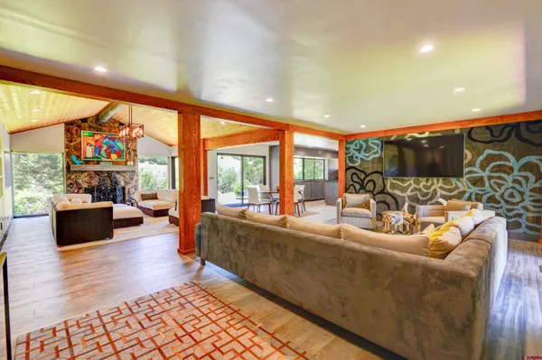 a view of a living room and a large window
