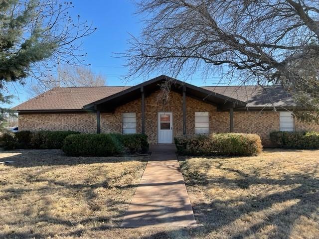 1045 Clark Road Abilene, TX 79602 - Photo 1 of 1 a front view of a house with a yard