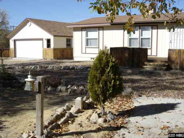 15505 Toll Road Reno, NV 89521 - Photo 1 of 9 a view of a house with a yard