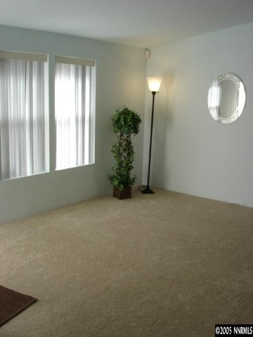 15505 Toll Road Reno, NV 89521 - Photo 4 of 9 a view of an empty room with a window