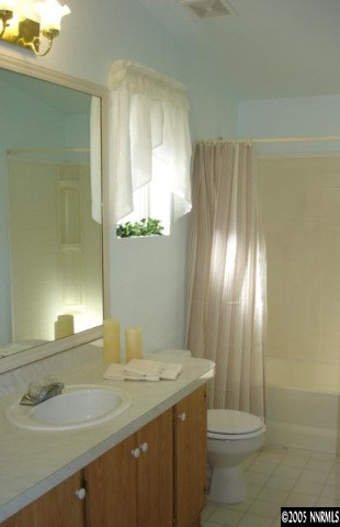 15505 Toll Road Reno, NV 89521 - Photo 5 of 9 a bathroom with a sink and a mirror