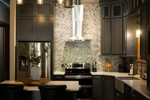 a kitchen with a table and chairs in it