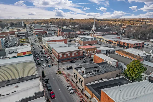 an aerial view of a building with outdoor space
