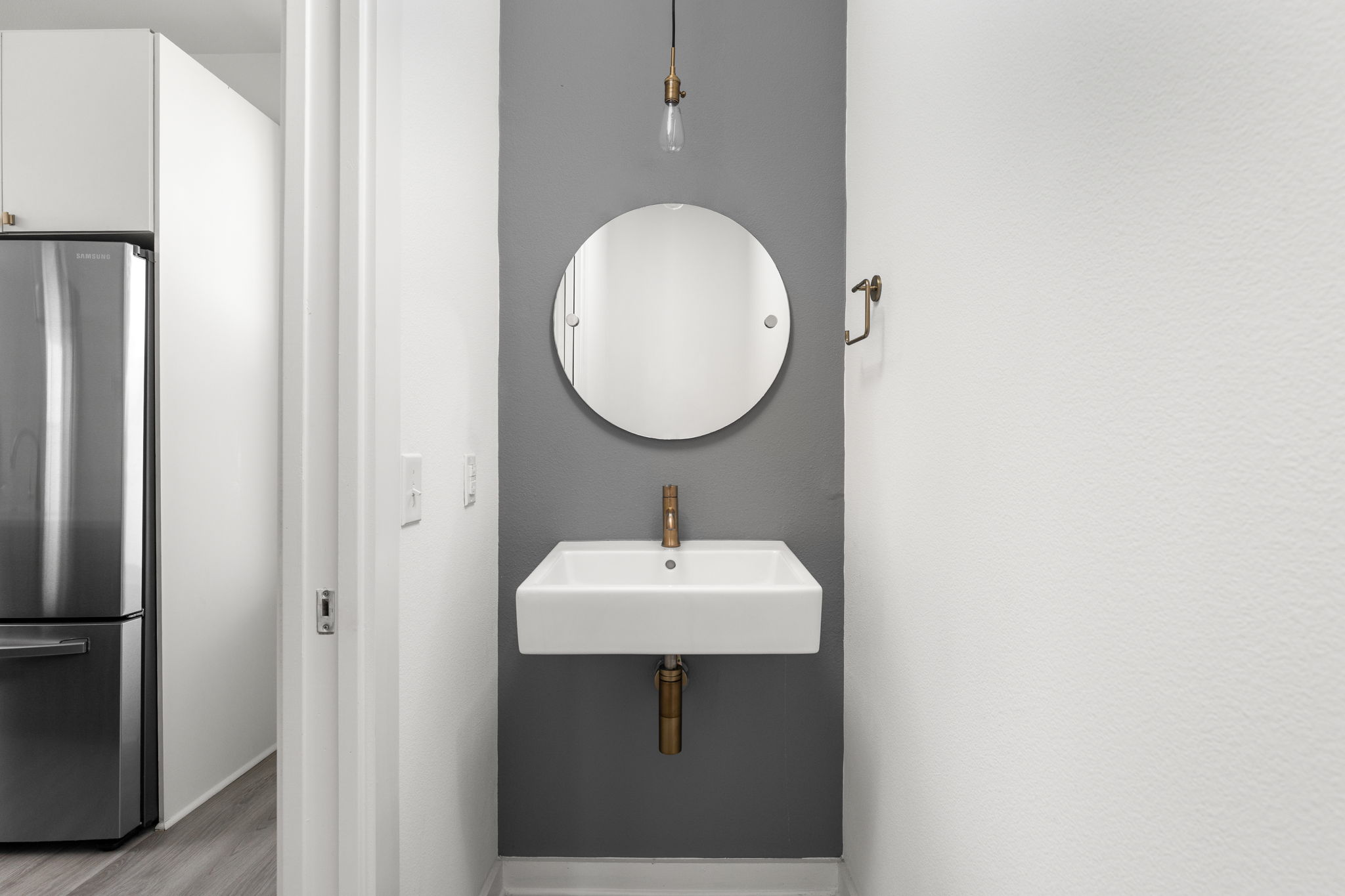 2624 Metcalfe Road, Unit 17 Austin, TX 78741 - Photo 10 of 35 a bathroom with a sink and mirror
