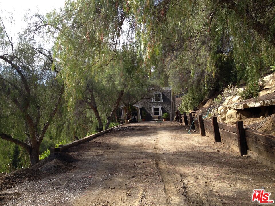 2445 Burson Road Topanga, CA 90290 - Photo 12 of 14 a view of a road with trees