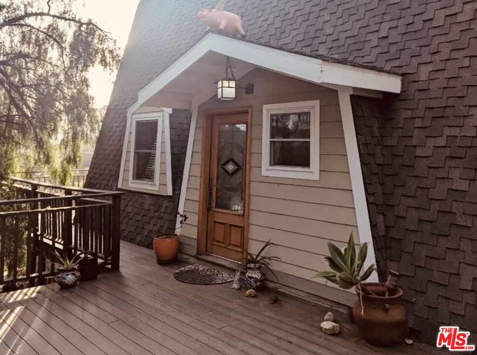 2445 Burson Road Topanga, CA 90290 - Photo 14 of 14 a front view of a house with a yard